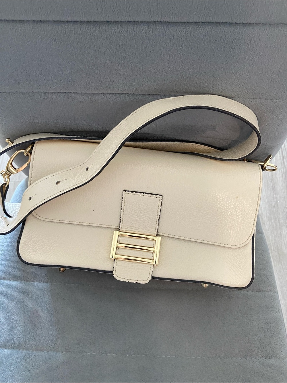 Cream Leather Shoulder Bag with Gold Buckle Accent
